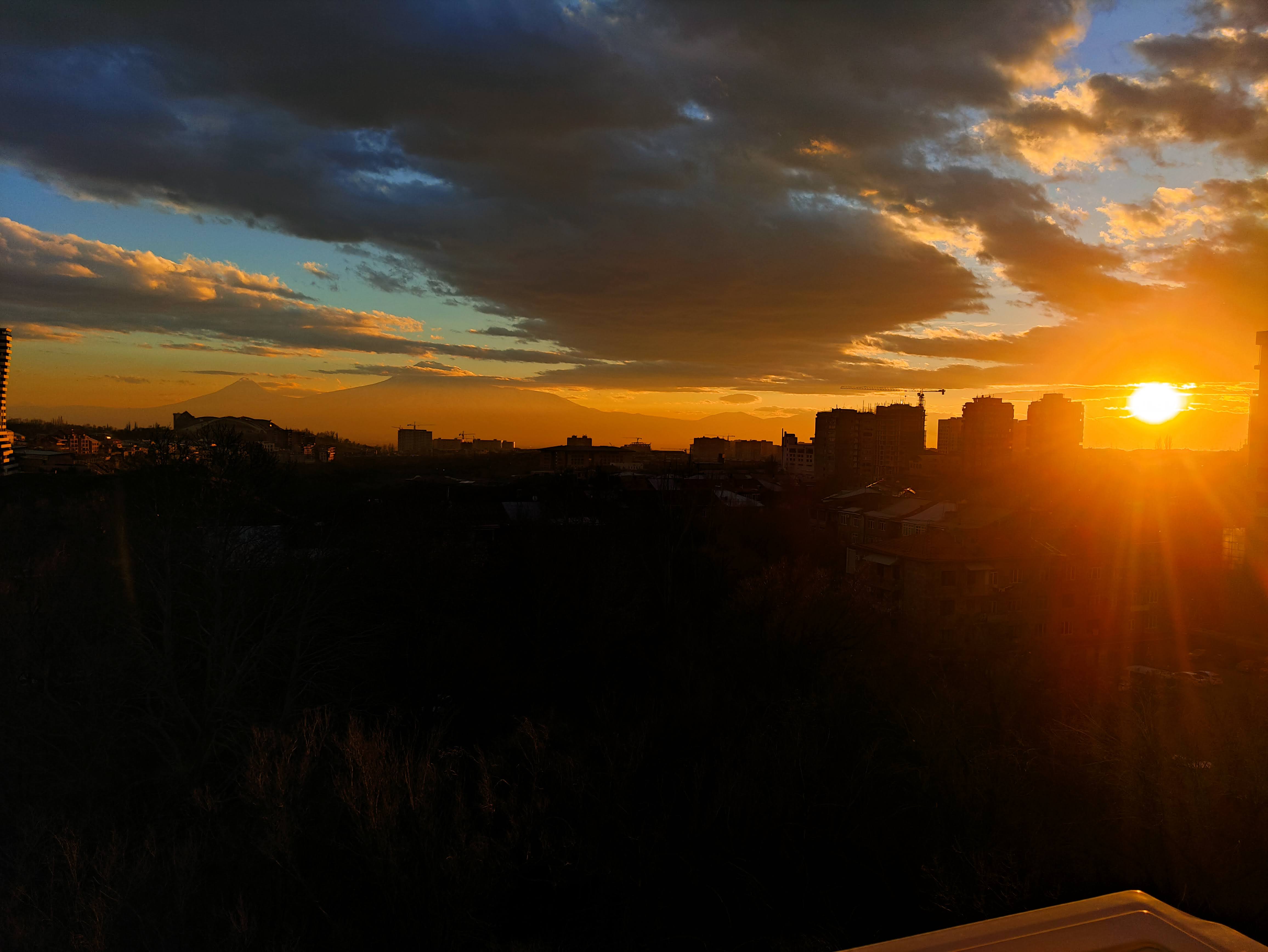 Sunset over the city with Mount Ararat
